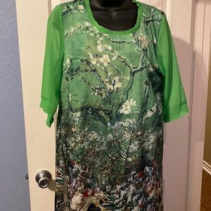 Funky green dress with chiffon underlay peeking through side slits